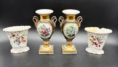 three vases are sitting next to each other on a table