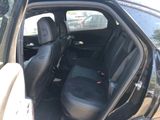 a black car with two seats in the back of it