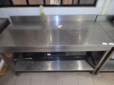 a stainless steel counter in a commercial kitchen