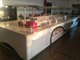 an image of a restaurant with a long counter