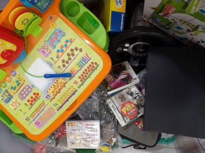 a pile of children ' s toys and toys on a table