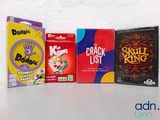 several boxes of cereal are lined up on a table