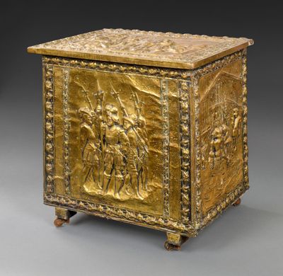 a gold box with a scene of a man and a woman on horseback