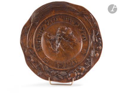 an image of a brown plate with a picture of a man on it