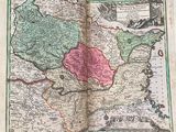 an old book with a map of the country of italy