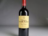 a bottle of wine that is sitting on a table