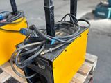 a couple of welding equipment sitting on top of a pallet