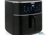 a black air fryer sitting on top of a white counter