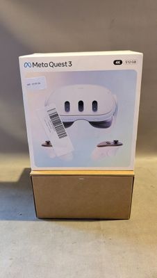 emballage d'une console de jeux Nintendo Wii posée sur une boîte en carton