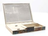 a small box with a mirror on top of it