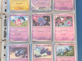 a close up of a binder with a bunch of cards in it