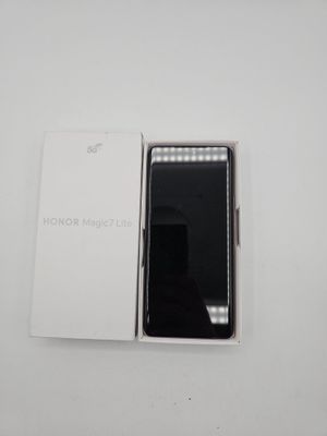 an open box with a phone inside of it sitting on a table