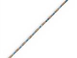 a close up of a wooden stick with beads on it