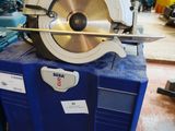 a machine that is sitting on top of a blue box