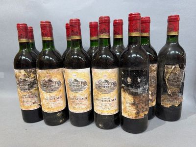 several bottles of wine are lined up on a table
