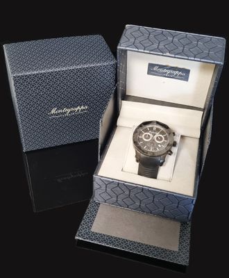 a watch that is in a box on a table