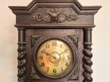 a clock that is on the wall in the room