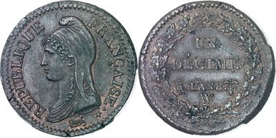a silver coin with a woman ' s head and a crown on it