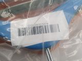 a plastic bag with a blue handle and a barcode on it