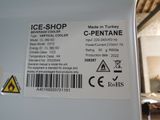 a label on the side of a refrigerator that says ice shop