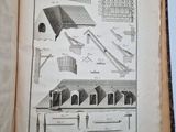 an open book with a drawing of a building on it