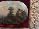 an old picture of a painting of a mountain scene in a gold frame