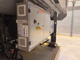 a machine that is sitting inside of a building