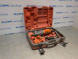 an orange tool case with tools in it on the floor