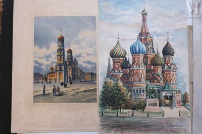 painting of a picture of a building with a clock tower and a picture of a church