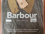 a plastic bag with a brown jacket on it