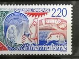 deux timbres avec la photo d'un homme et d'une femme