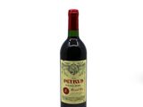 a bottle of wine that is sitting on a table
