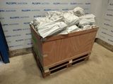 a wooden box with a bunch of bags on top of it