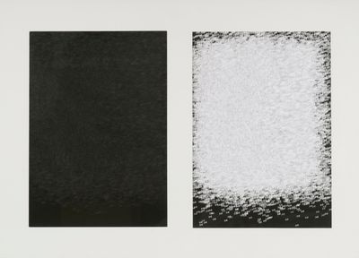 a black and white photograph of two squares of white and black paint