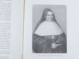an open book with a picture of a nun in a nun ' s robes