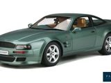 the green model of a sports car is shown on a white background