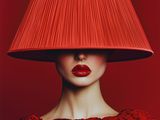 woman in red dress with red lampshade on her head
