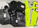 three jackets and two jackets with tags on them