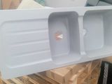 a large white box with two compartments inside of it