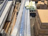 a lot of boxes and pallets in a warehouse