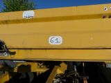 a close up of a yellow truck with a number on it