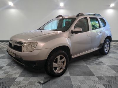 a picture of a silver car parked in a garage