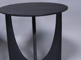 pair of black side tables on a white background with a white background