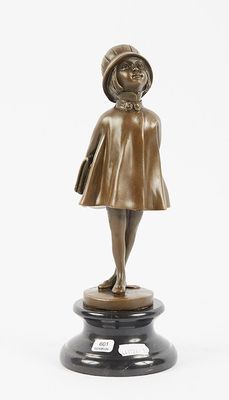 a bronze statue of a woman in a hat and dress