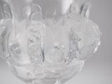 a clear glass vase with a lot of frosting on it