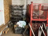 a room that has a bunch of cages on the floor