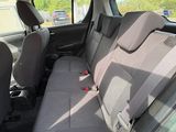 the back seats of a car are empty with no one in it