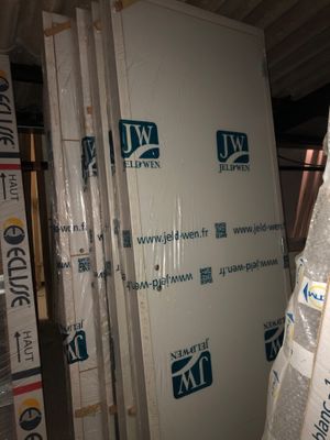 a room that has a lot of boxes on the floor