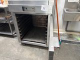 an image of a commercial kitchen with stainless steel appliances