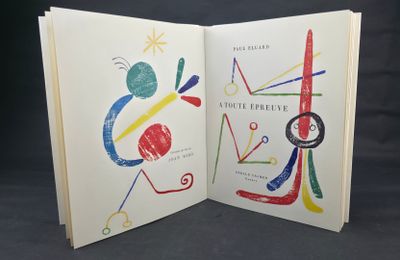 an open book with a picture of a man and a woman on it